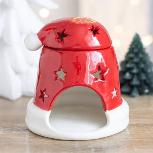Brûleur à mazout avec chapeau de Noël rouge